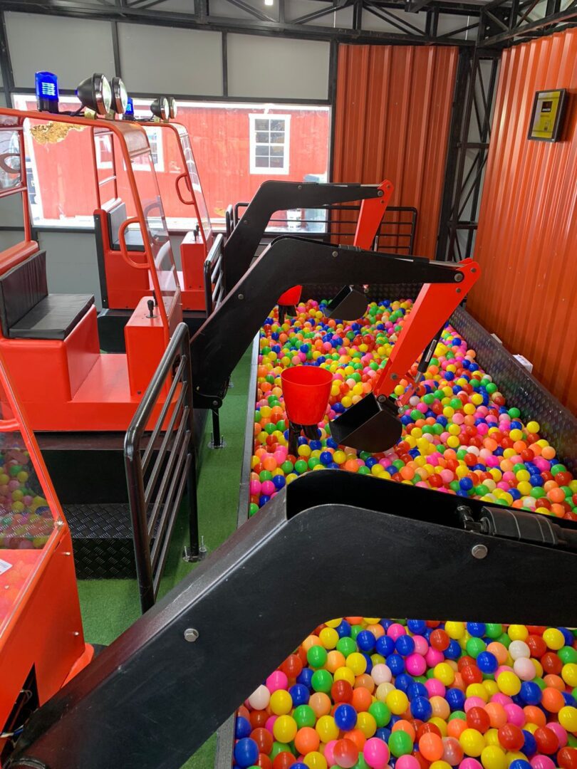 A ball pit filled with lots of colorful balls.